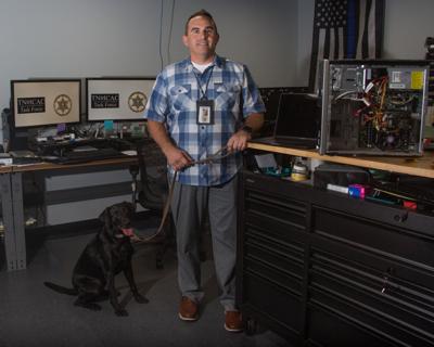 Williamson County Sheriff's Office ASD K-9 Remi and Detective Sergeant and Digital Forensic Examiner Lee Eaves
