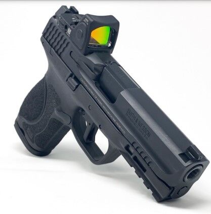 Smith and Wesson M&P M2.0 9mm pistol outfitted with a Trijicon RMR06 red dot sight.