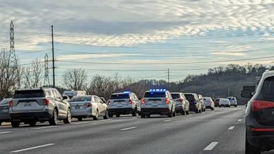 Officers at the scene of a police shooting on I-65 Thursday, Jan. 27