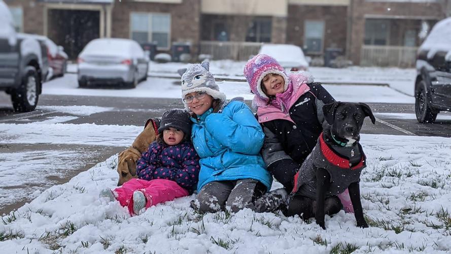 Snow kids and dog