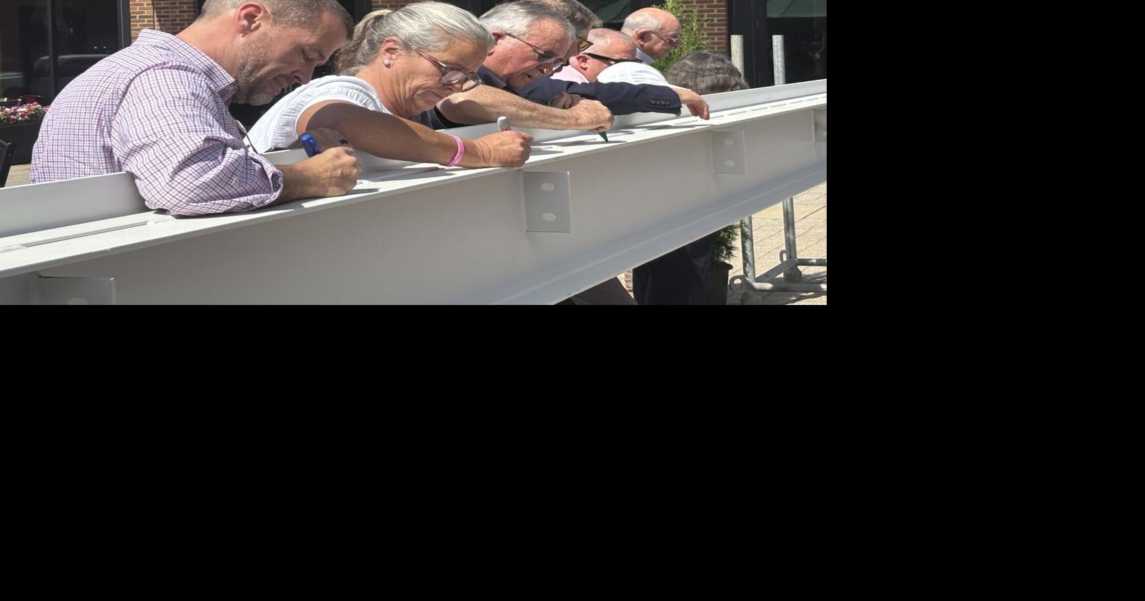 Franklin Residents Sign Final Beam to go in City Hall Construction