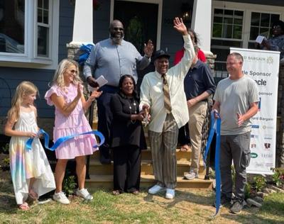 Hard Bargain ribbon cutting