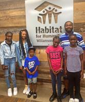 Schneider Electric provides $20K for local Habitat for Humanity’s 2 new homes in Columbia