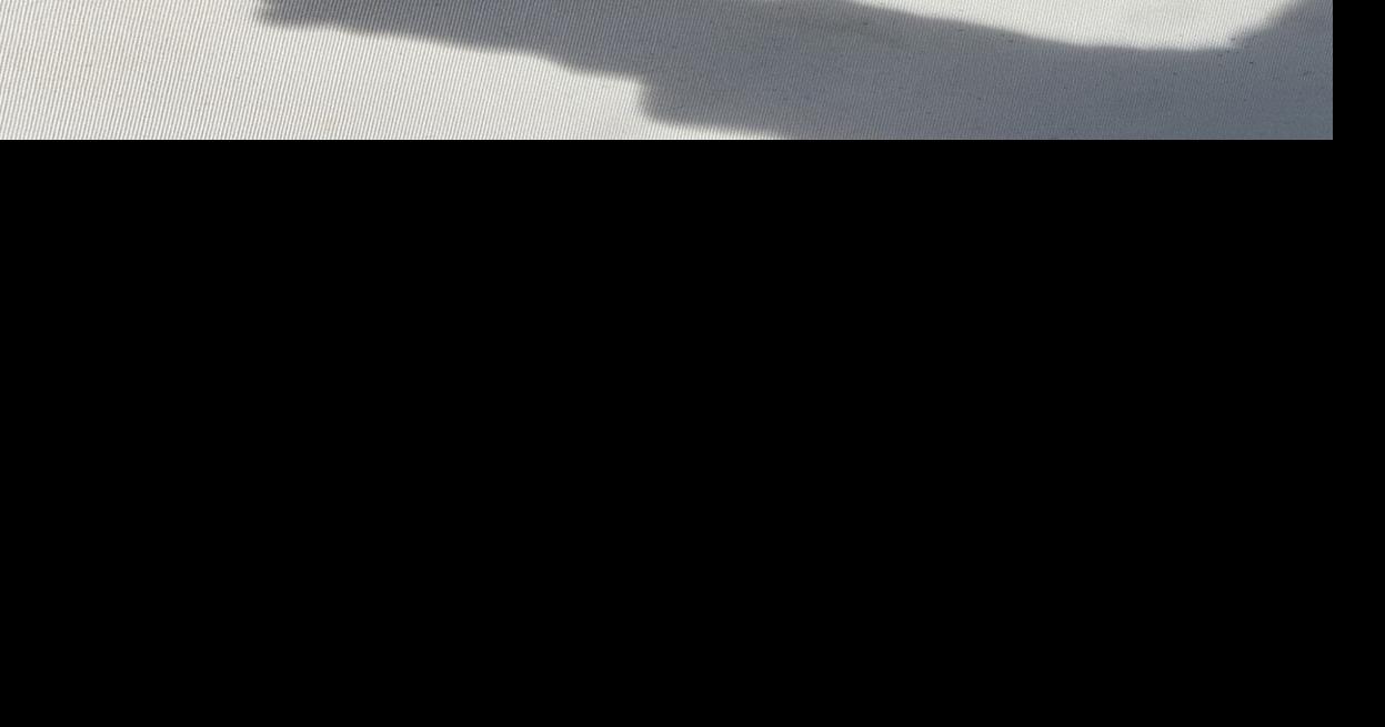 Shadow of colander during partial solar eclipse