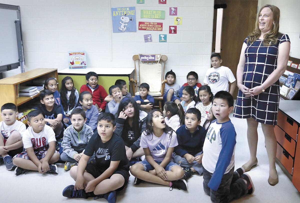 bass-hoover-elementary-school-esl-teacher-awarded-with-check-news