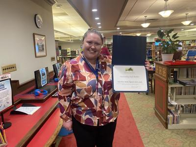 Katie Moss of Handley Library receives recognition for dedication