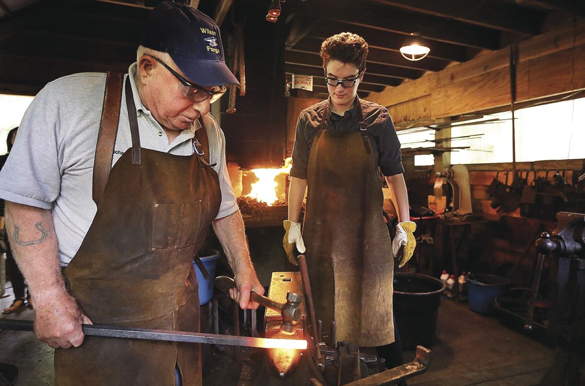 Local blacksmiths ahead with oldtime craft Features