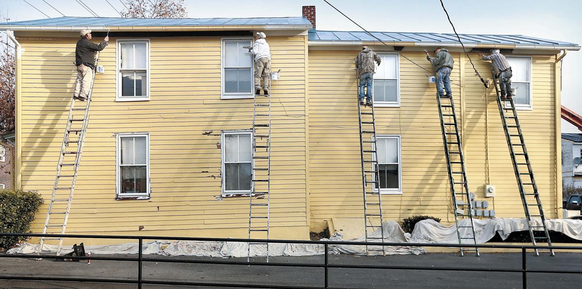 Five painters painting Winchester