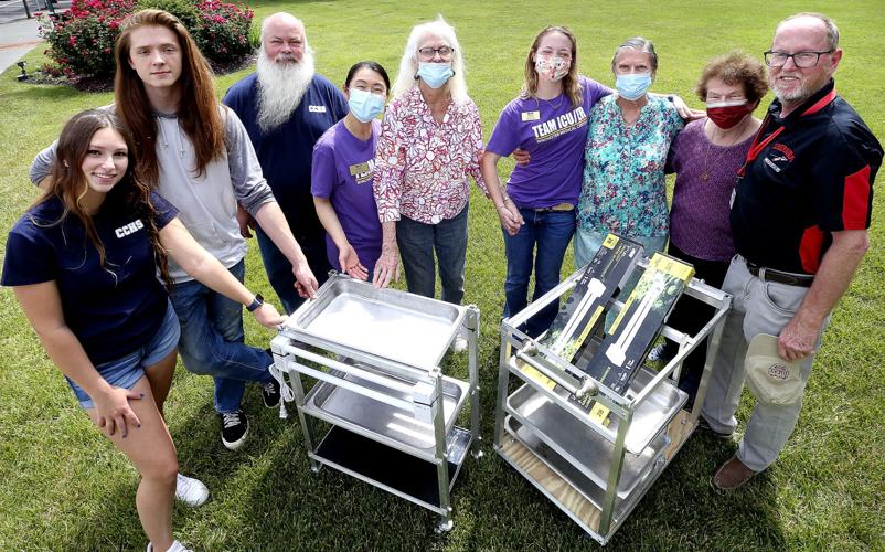 Carts created in Widget Cup competition presented to Adult Day Care
