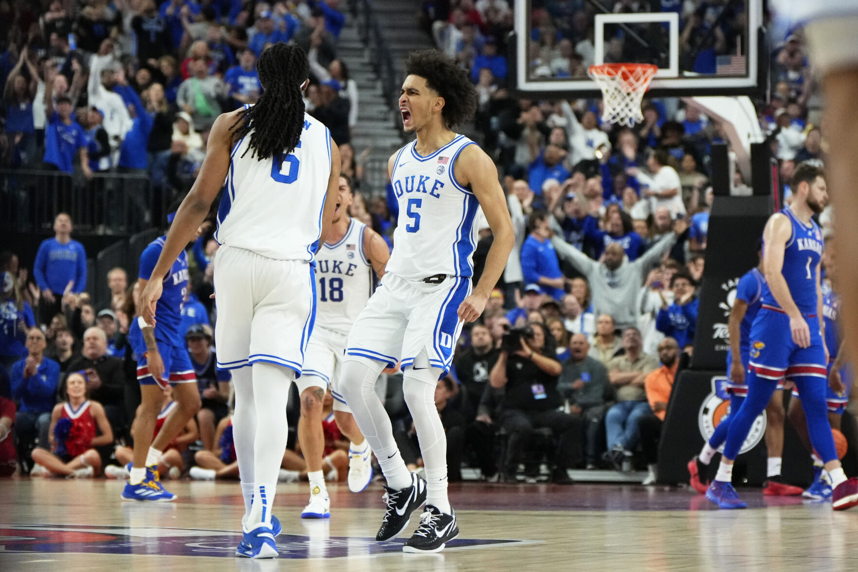 Kansas Center Hunter Dickinson Ejected For Kicking Duke's Maliq Brown ...