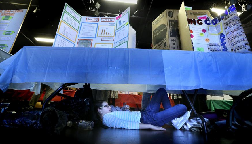 Frederick students show off experiments at science fair ...