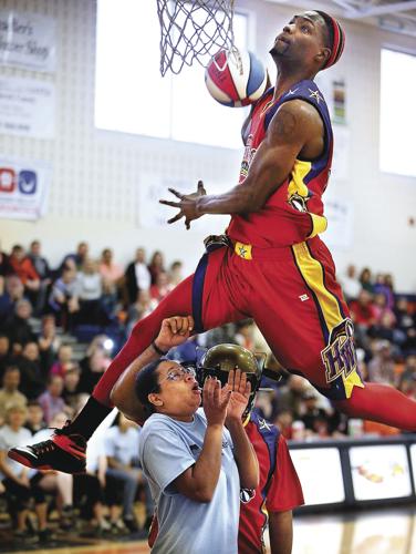 Harlem Wizards work their basketball magic for Sandrock fundraiser