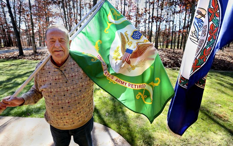 Collecting flags a joy for retired colonel who joined Army on Veterans
