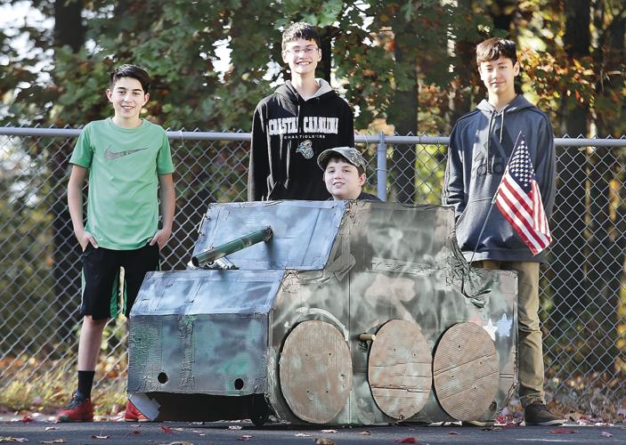 Tank covers wheelchair so boy can trickortreat Winchester