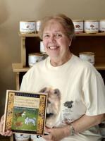 Former teacher's first book a fanciful tale of time-traveling dogs