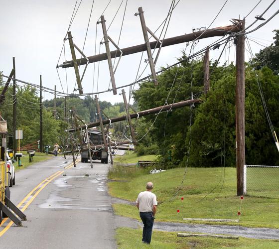 Powerful storm topples about 2 dozen power poles along Greenwood Road; 4K without electricity