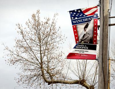 Donations sought to help repair wind-damaged military tribute banners ...