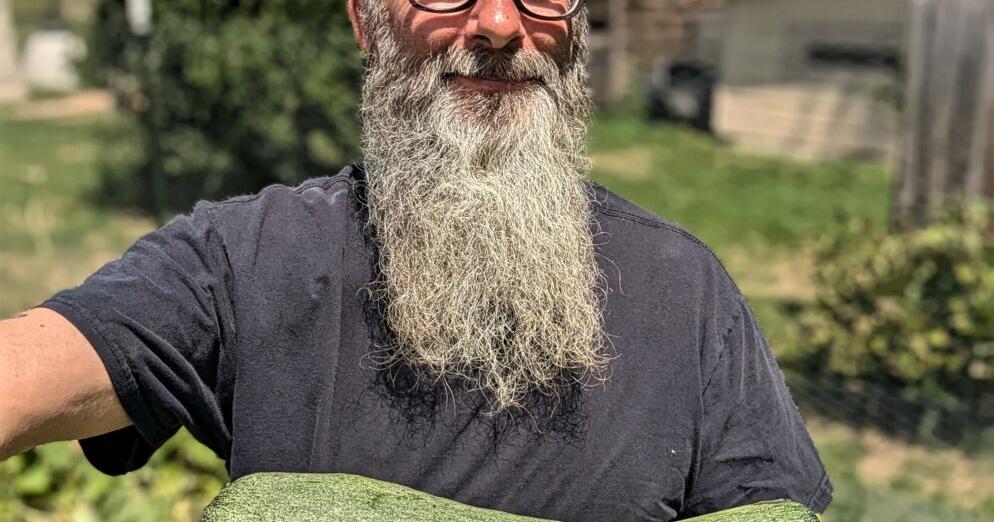 Local farmer helping to propagate ancient plant