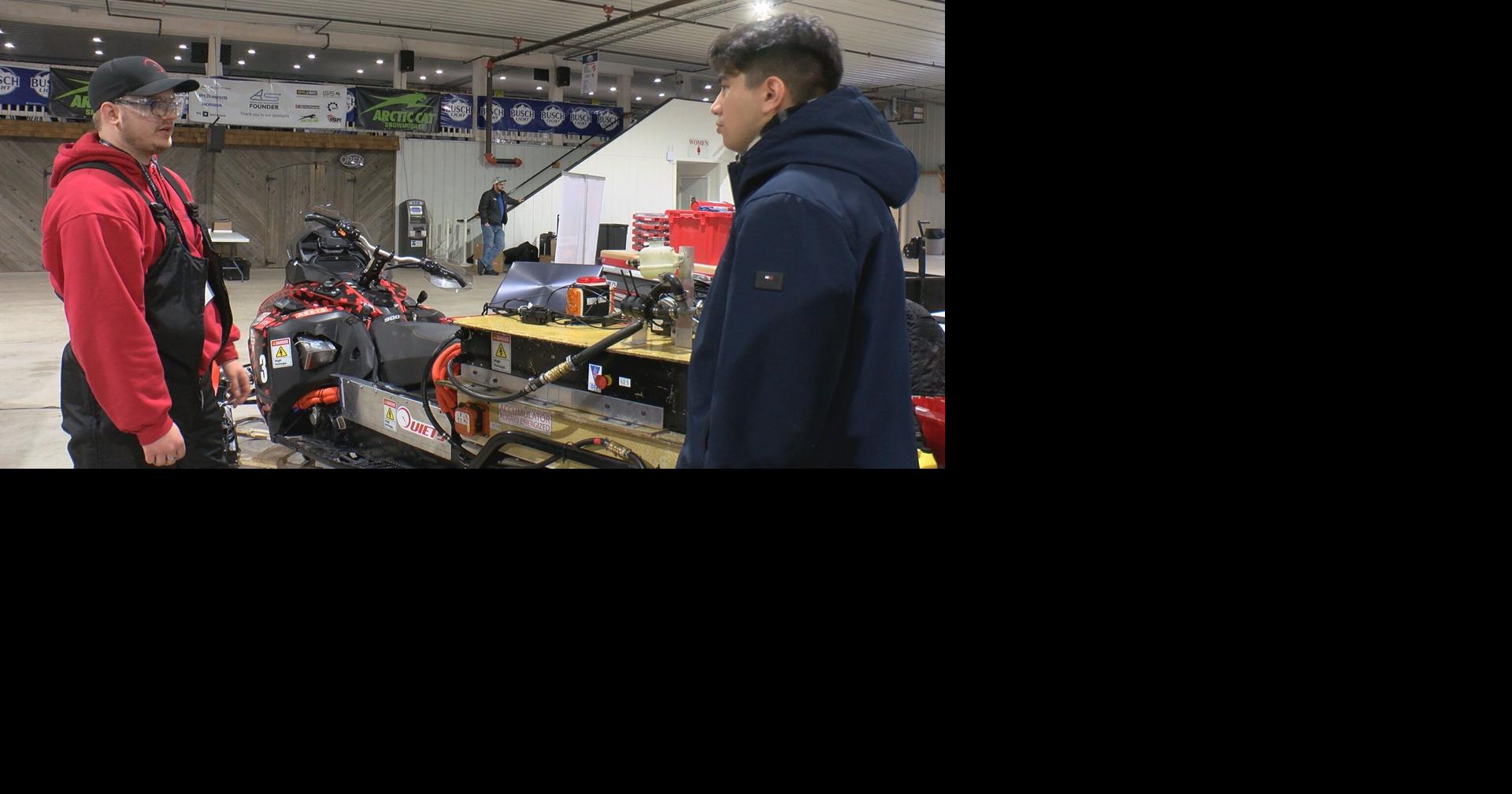 Students working on the future design of snowmobiles