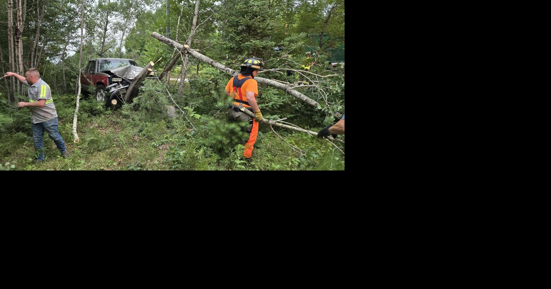 Pickup truck crashes into trees on County Highway W in Pine Lake