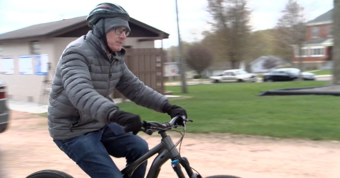 Gov. Tony Evers gravel bikes in Athens in celebration of national tourism week