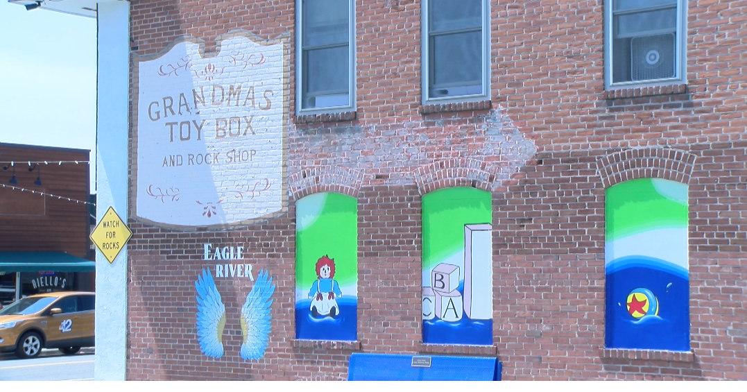 Young artist brings some color to Grandma's Toy Box in Eagle River