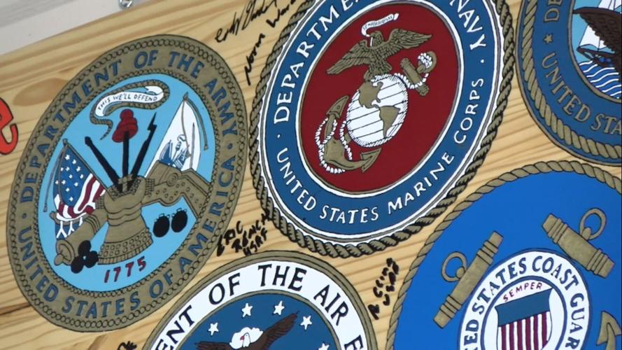 Rhinelander man inspired by veteran father, paints sign to honor local ...