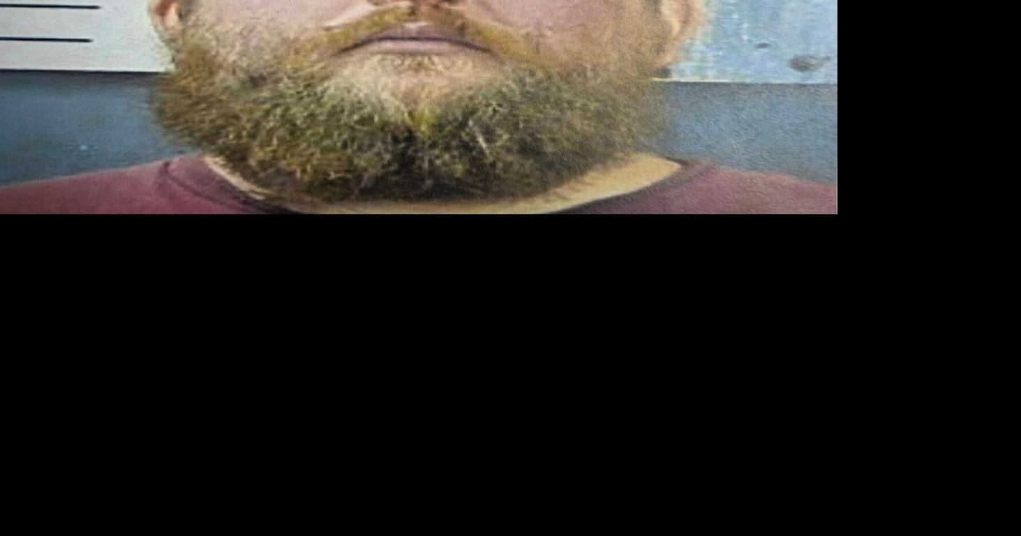 Man arrested with body armor and a suitcase filled with ammunition ...