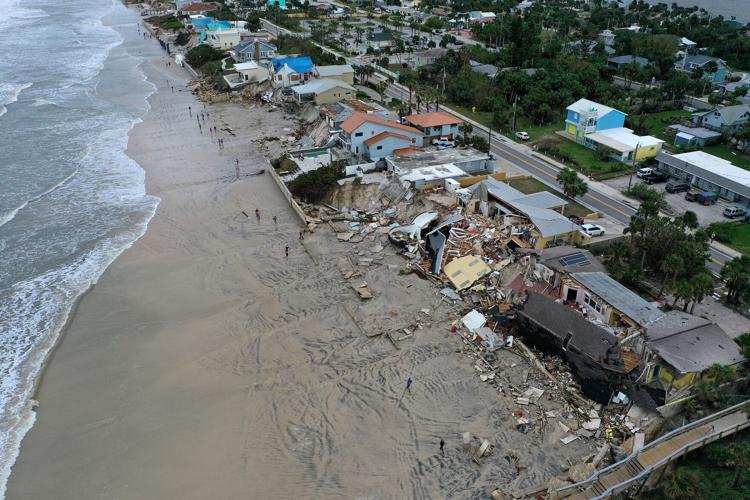 Florida picks up after Nicole kills at least 5 and leaves 'unprecedented' damage to Daytona-area coastline
