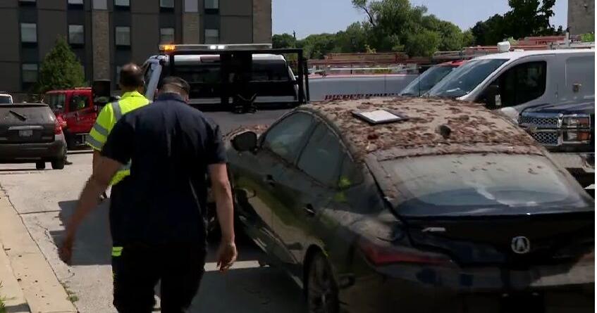 Crews begin removing cars from flooded West Allis apartment garage