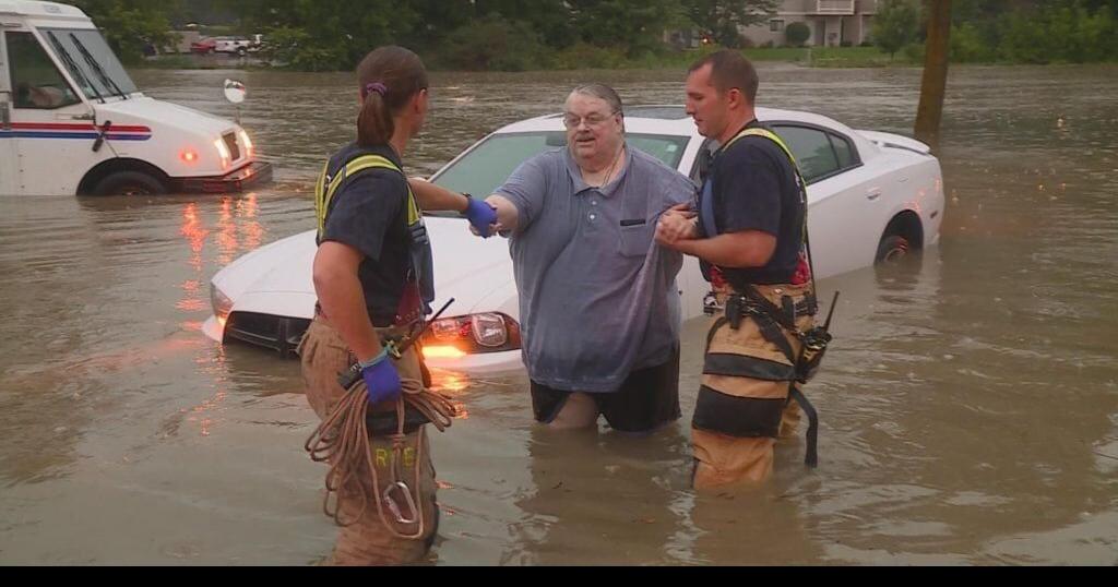 Man rescued from car after getting stranded in flood water | Archive ...