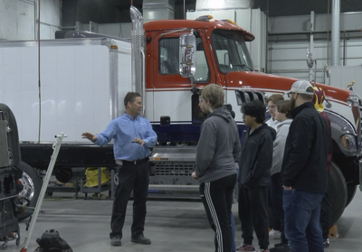 "These are really good jobs": High school students get tour of trucking