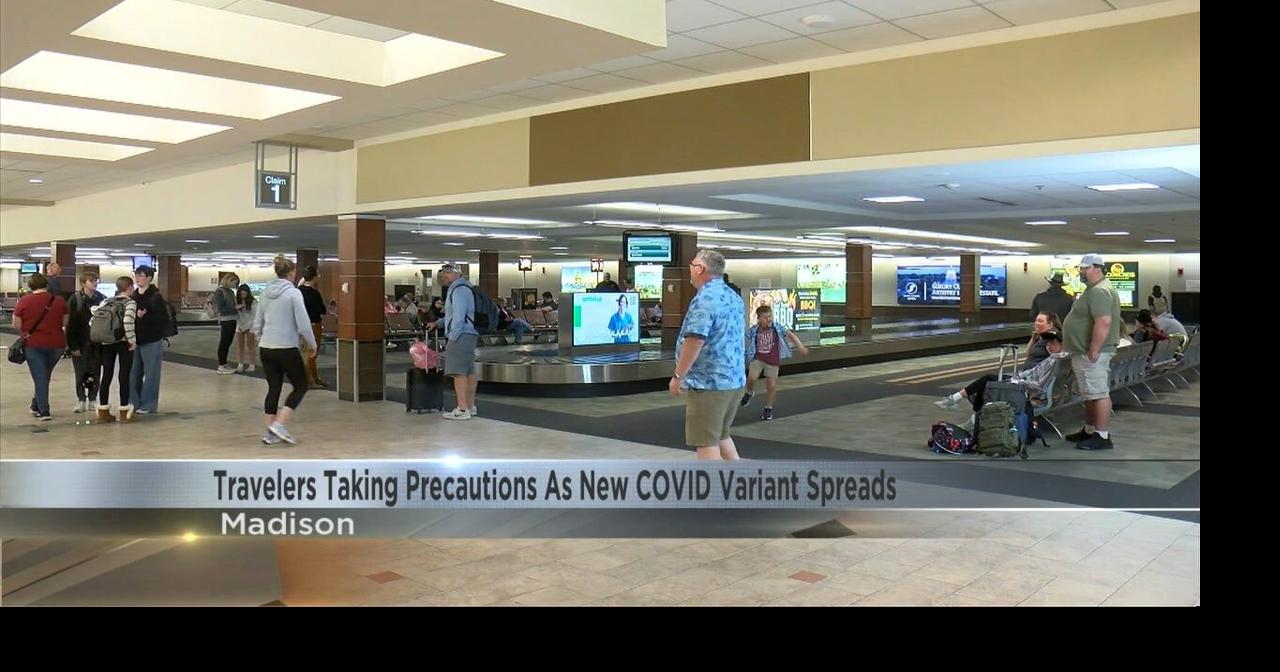 headline: Travelers taking precautions as new Covid-19 varia