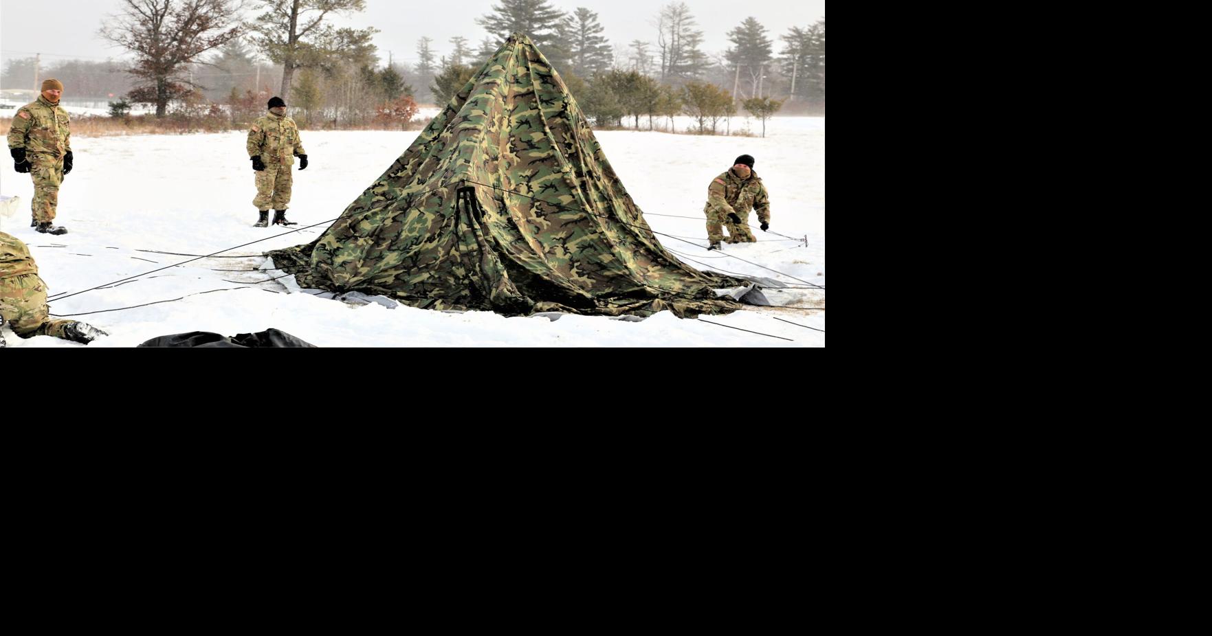 Soldiers learn to build tents during training at Fort McCoy