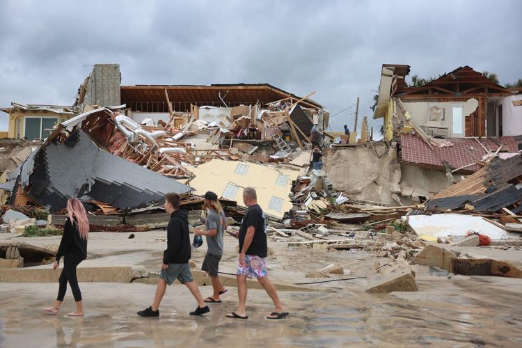 Florida picks up after Nicole kills at least 5 and leaves 'unprecedented' damage to Daytona-area coastline