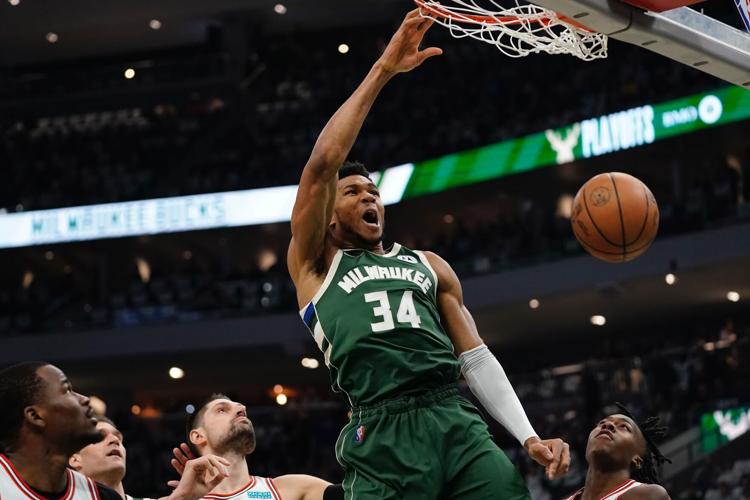 Stephen Curry and Giannis Antetokounmpo star in Golden State Warriors and  Milwaukee Bucks wins | Sports | wktv.com