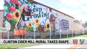 Photo illustrating article: Clinton Cider Mill Gets New Mural
