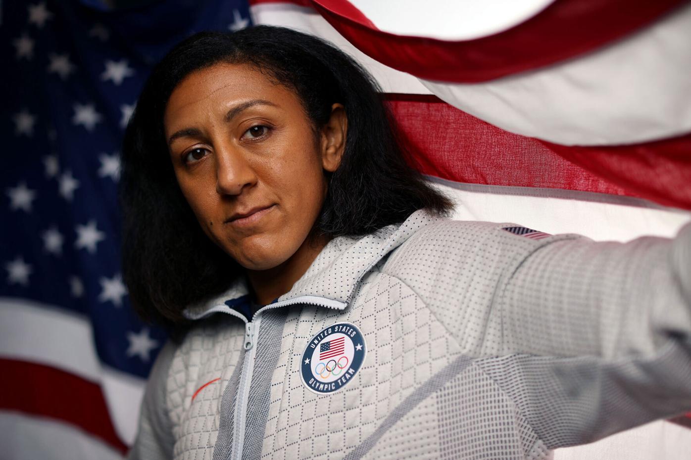US gold medal hopeful Elana Meyers Taylor in race against time after  positive Covid test at Winter Olympics | Sports | wktv.com