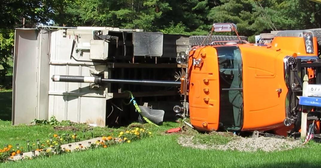 Town of Marshall dump truck pulls down wires, tips over on West Hill ...