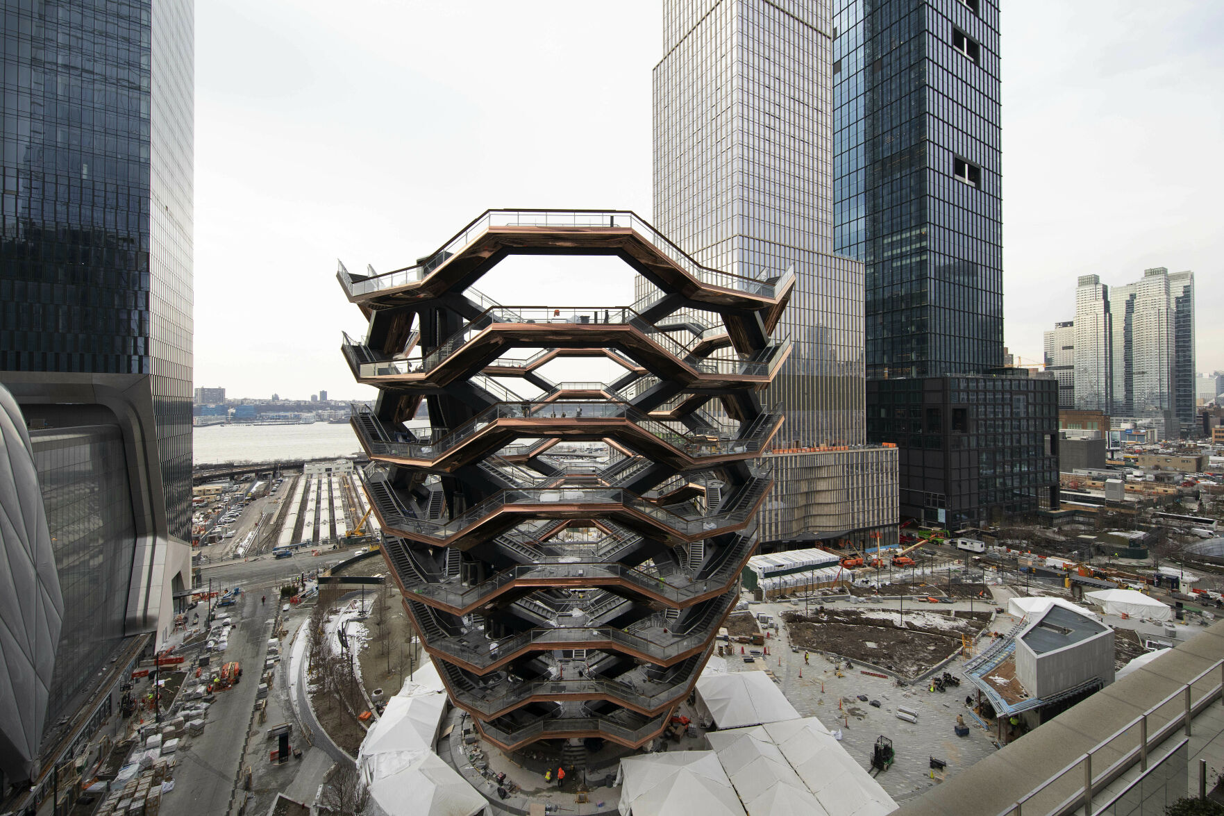 Tourists Return To NYC's Vessel Sculpture After It Reopens With Netting ...