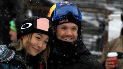 Louie Vito hugs fellow snowboarder Chloe Kim