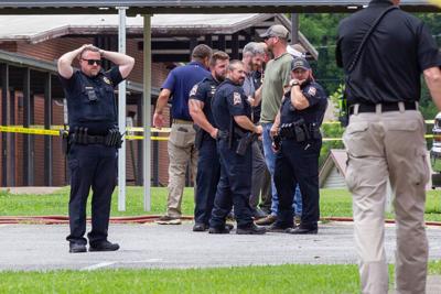 A man appearing to try entering an Alabama elementary school is shot and killed by a school resource officer