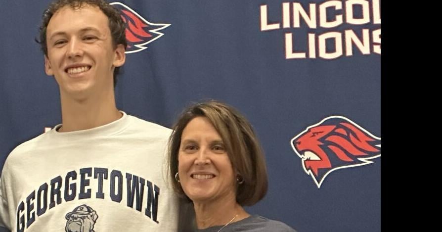 McGAIR: Standout swimmer Holden Brown appreciates support from family at Lincoln High's Signing Day ceremony