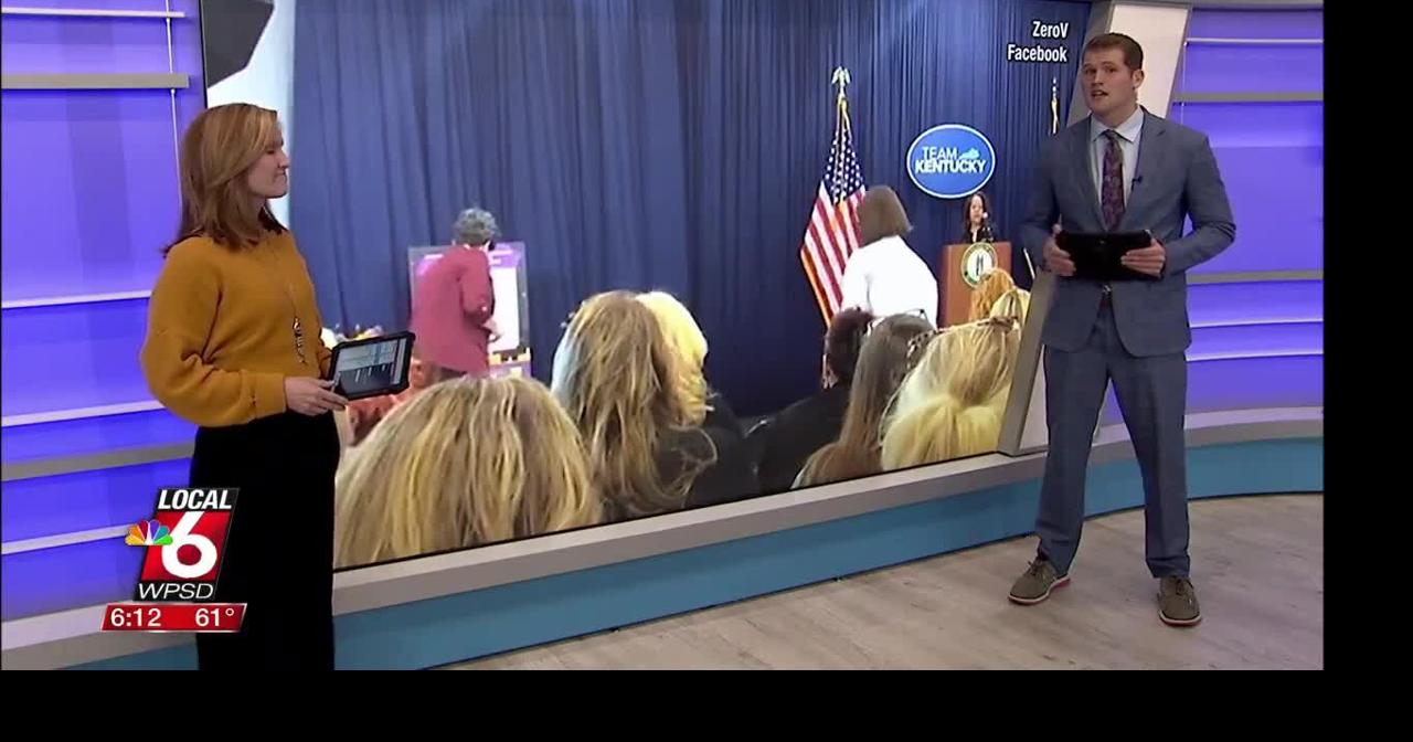 Kentucky First Lady standing alongside domestic violence survivors