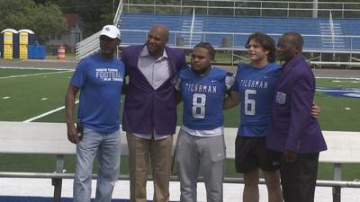 George Wilson presented with Kentucky Pro Football Hall of Fame jacket
