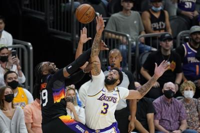 CP3, Suns beat Lakers 100-92, even series after Davis hurt