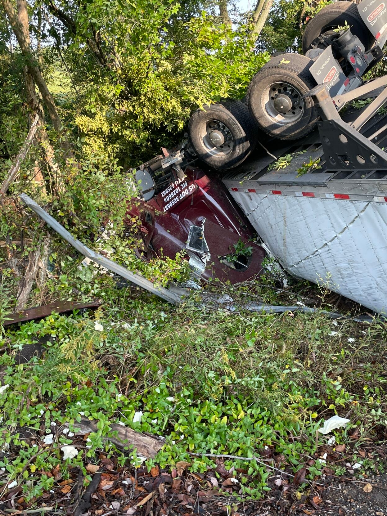 Driver injured in semitrailer crash that blocked Purchase Parkway for ...