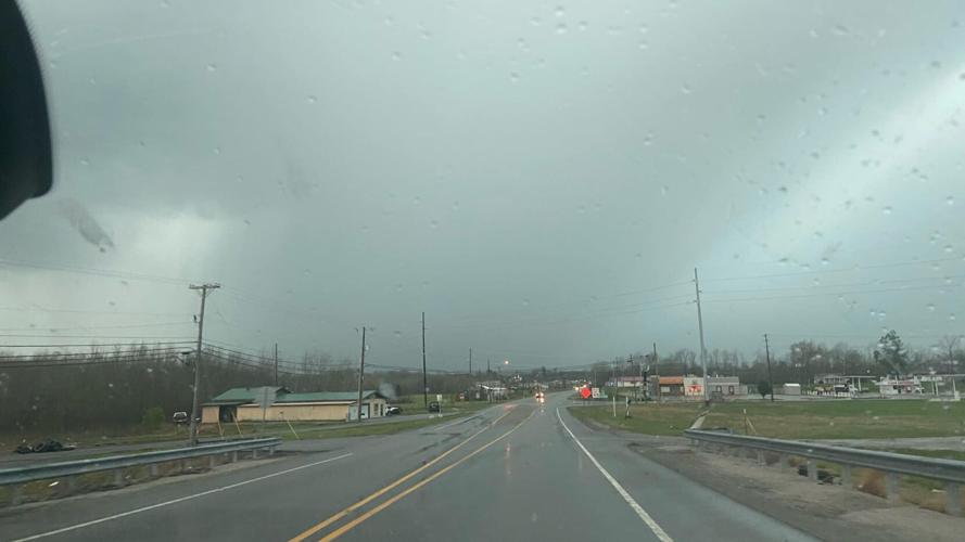 A photo taken at 5:16 p.m. on April 13 shows storm clouds and rain in Dawson Springs in Hopkins County, Kentucky