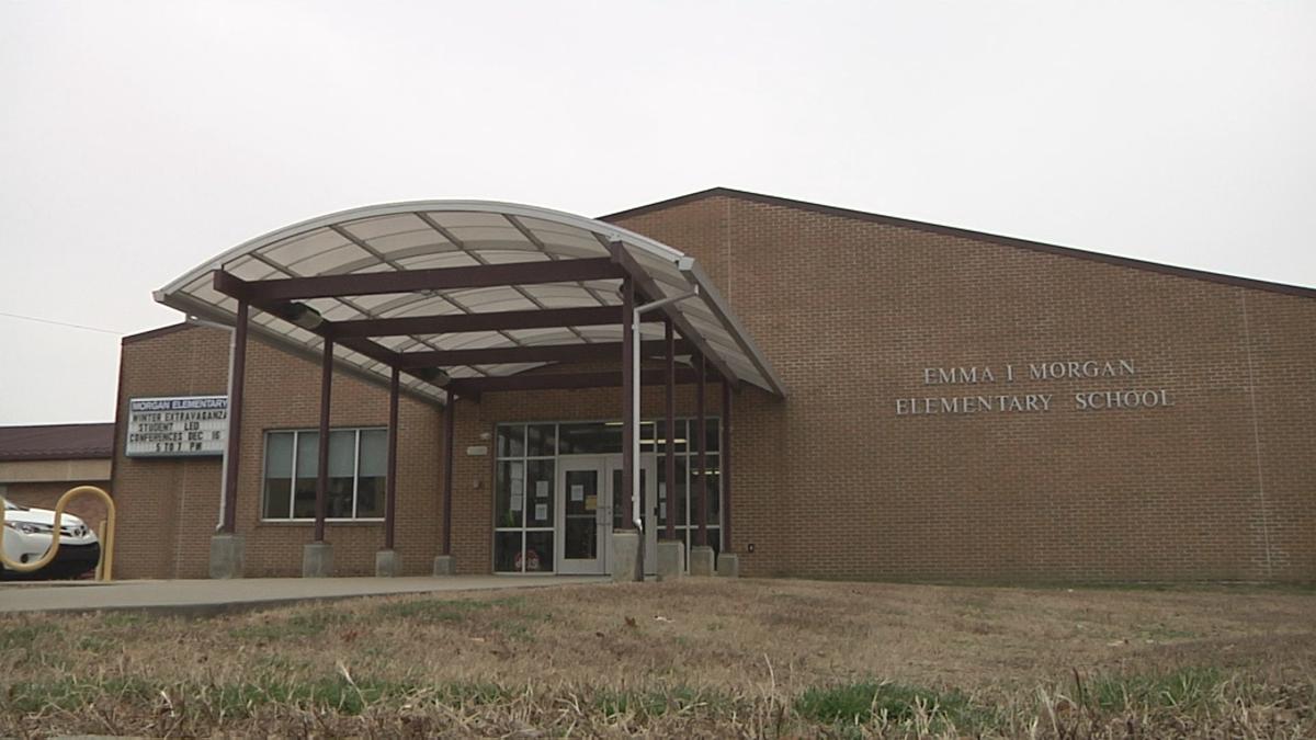 Local firefighters give winter coats to firstgraders at