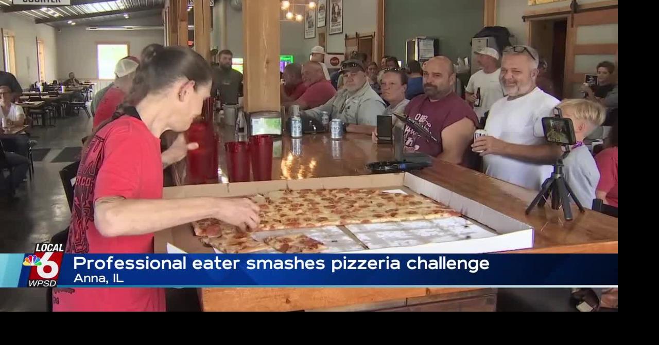 Professional eater smashes pizzeria challenge